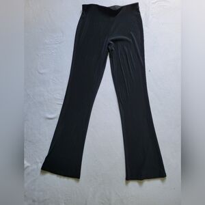 Fina, elastic waist, super comfy black stretch, slight flair pants.